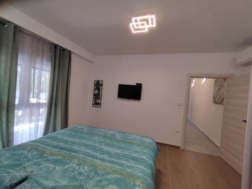 Katil atau katil-katil dalam bilik di Lennida Apartman with free parking