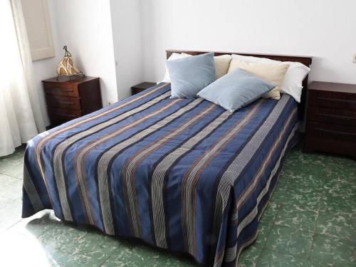 Ένα ή περισσότερα κρεβάτια σε δωμάτιο στο Acogedor Apartamento Rústico en Pirineos