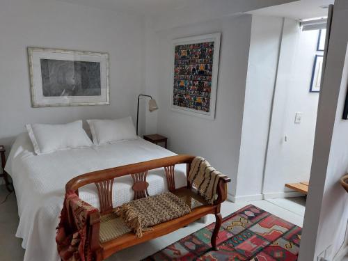 Ένα ή περισσότερα κρεβάτια σε δωμάτιο στο Loft con terraza en San Isidro