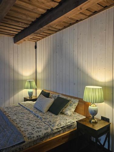 Ένα ή περισσότερα κρεβάτια σε δωμάτιο στο More Holiday Cottage M, 85 meters to the beach with large garden