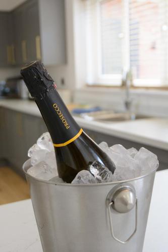 a bottle of champagne in a bucket of ice at The Orchard in Telford