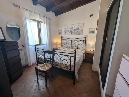 Postel nebo postele na pokoji v ubytování casa vacanze Villa BAIA-LUNA