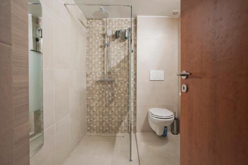 Koupelna v ubytování SeaLiv Apartment by LobbySquare