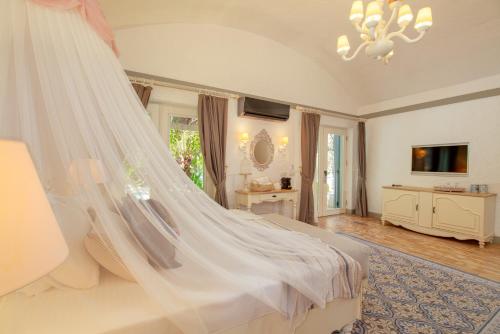 Μια τηλεόραση ή/και κέντρο ψυχαγωγίας στο Flamingo Hotel & Spa - Pet Friendly