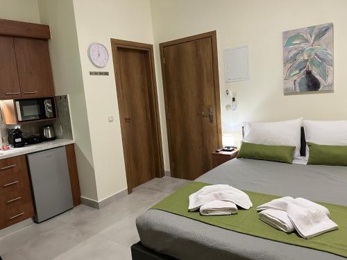 Letto o letti in una camera di GREENHOUSE maleme