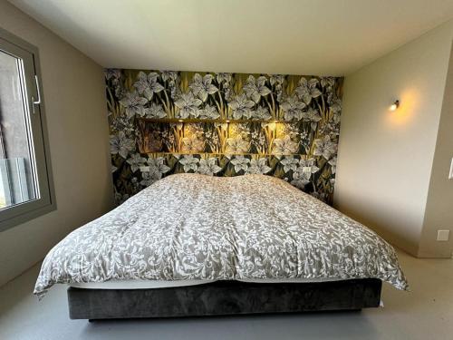 Una cama o camas en una habitación de Incantevole open space vista lago