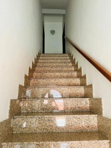 a set of stairs in a house at casa vacanza con terrazza in Laterza