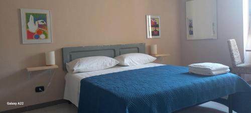 Ένα ή περισσότερα κρεβάτια σε δωμάτιο στο Trulli & Case Fichi 3