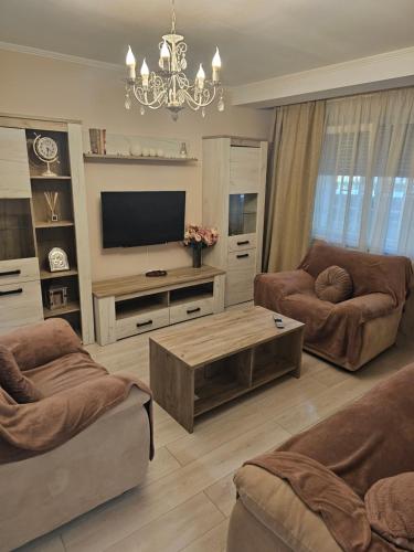 Televisyen dan/atau pusat hiburan di Dary Apartment
