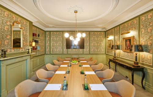 a conference room with a long table and chairs at Milford Hall Salisbury in Salisbury