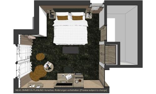 a floor plan of a room with a bed at Vital & Sporthotel Brixen in Brixen im Thale