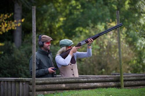 a man and a woman holding a gun at SCHLOSS Roxburghe, part of Destination by Hyatt in Kelso