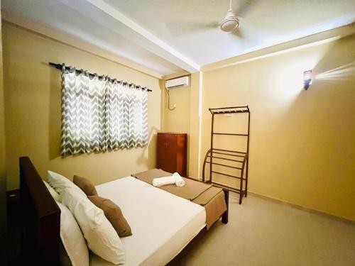 Кровать или кровати в номере Serene Vista Villa, formerly Bungalows