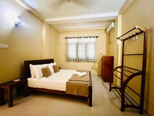 Кровать или кровати в номере Serene Vista Villa, formerly Bungalows