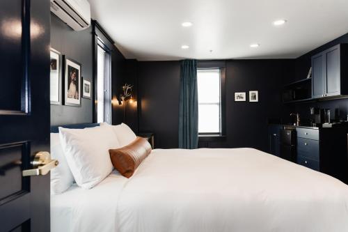 Katil atau katil-katil dalam bilik di The Hotel Melrose
