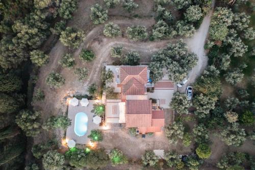 an aerial view of a house with a pool at Akrotiri Sea View Maisonette in Akrotiri
