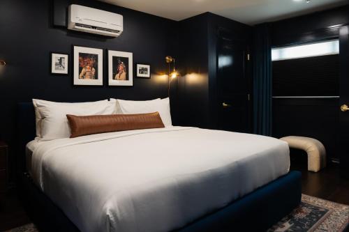 Katil atau katil-katil dalam bilik di The Hotel Melrose