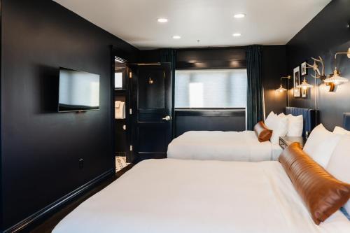 Katil atau katil-katil dalam bilik di The Hotel Melrose