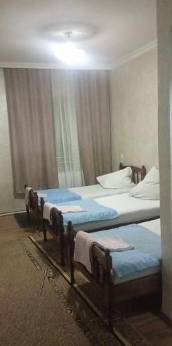 Postel nebo postele na pokoji v ubytování Hotel Nikea Paradiso