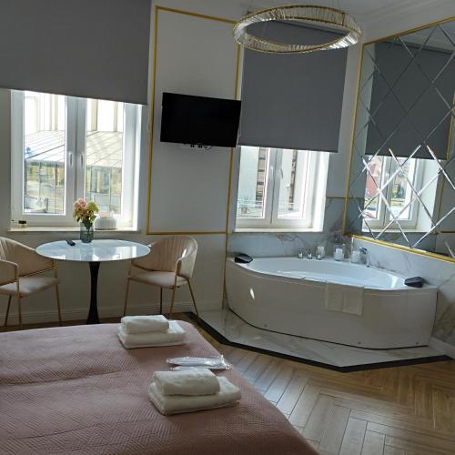 Ένα ή περισσότερα κρεβάτια σε δωμάτιο στο Apartament z Jacuzzi Nova Bydgoszcz