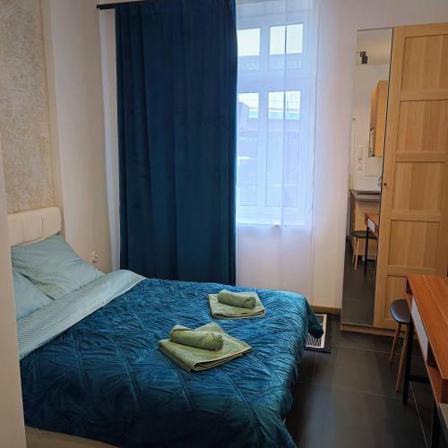Postel nebo postele na pokoji v ubytování MH Apartment