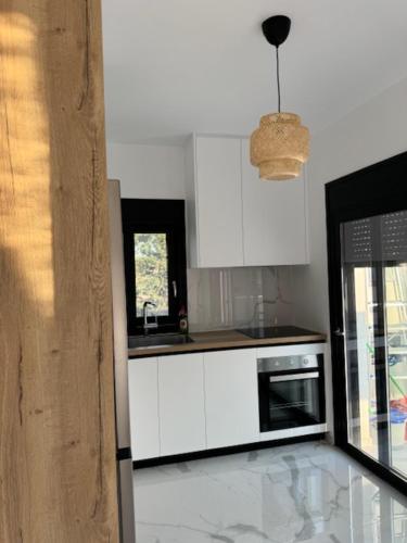 Η κουζίνα ή μικρή κουζίνα στο Angel Residence