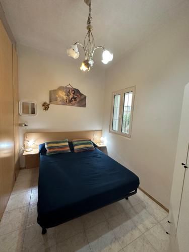 Postel nebo postele na pokoji v ubytování La Conchiglia