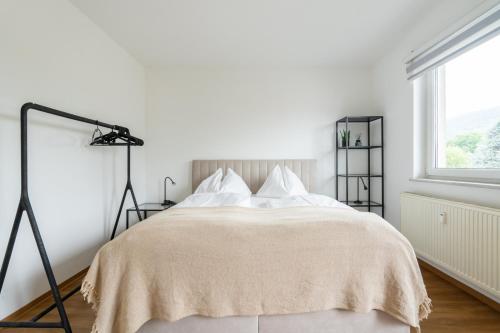 Postel nebo postele na pokoji v ubytování FarawayHomes Studio Graz #10