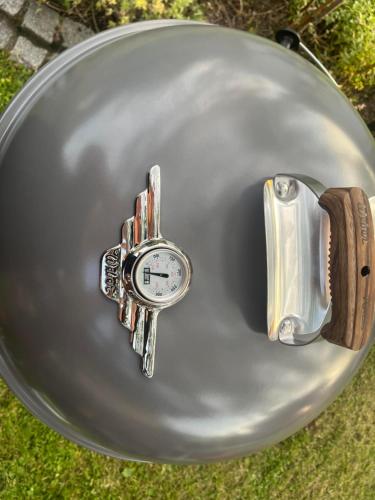 a gas tank with a clock on it at Bergpanorama in Bludenz