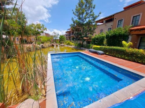 Bazén v ubytování Alojamientos Calicanto SMA nebo v jeho okolí