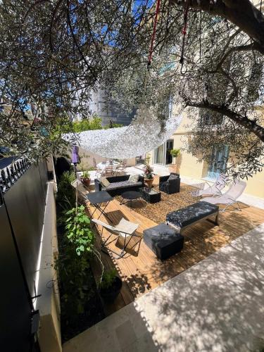 Grand rez de jardin terrasse calme centre-Ground floor quiet garden terrace near center of Nice