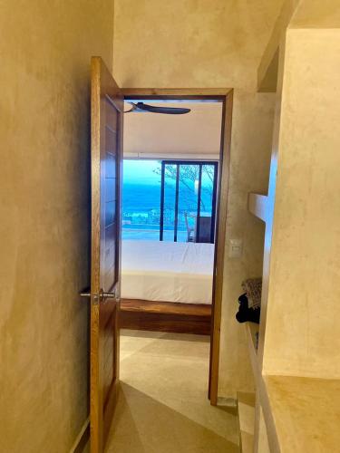 Ένα ή περισσότερα κρεβάτια σε δωμάτιο στο Casa Gaya