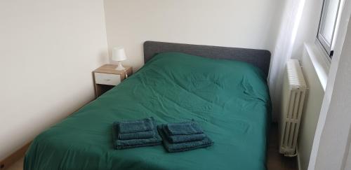 Krevet ili kreveti u jedinici u okviru objekta Cosy apartment close Eiffel Tower