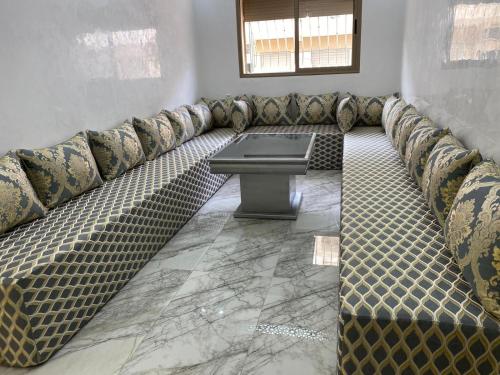 Ein Sitzbereich in der Unterkunft Bel appartement de plage - RDC - Dahomey Beach