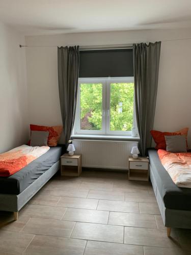 Ein Bett oder Betten in einem Zimmer der Unterkunft Villa Mariensiel 5 Schlafzimmer 2 Etagen
