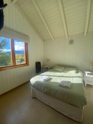 Postel nebo postele na pokoji v ubytování Departamento Artemisa