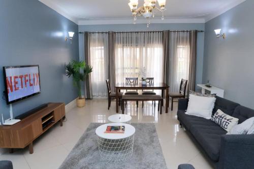 TV a/nebo společenská místnost v ubytování NCI Residence