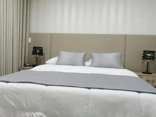 Postel nebo postele na pokoji v ubytování Apartamentos Montecarlo