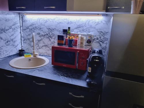Kuchyň nebo kuchyňský kout v ubytování Lust Hostel