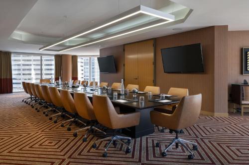 a conference room with a long table and chairs at Residence Inn by Marriott Chicago Downtown Magnificent Mile in Chicago
