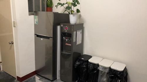 Kuchyň nebo kuchyňský kout v ubytování 阿霞袂睏MAMAzzzzHostel