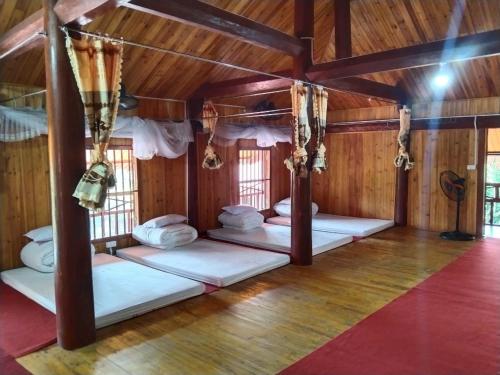 Postel nebo postele na pokoji v ubytování A Lìn Homestay Bắc Hà