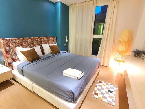 En eller flere senge i et værelse på The grand Caribbean condo Pool access