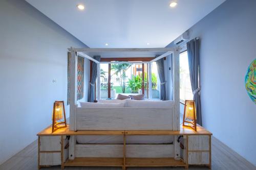 Кровать или кровати в номере Kamana Beach House