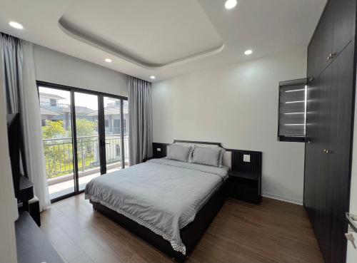 Postel nebo postele na pokoji v ubytování Chuỗi Villa 4 phòng ngủ - Vân Đồn - Gần Biển - Đầy đủ tiện nghi