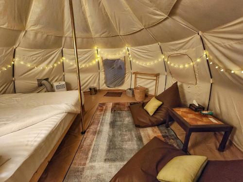 Postel nebo postele na pokoji v ubytování Bambus Restaurant, Bar & Glamping