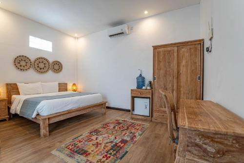 Postel nebo postele na pokoji v ubytování Gajahmina Guesthouse