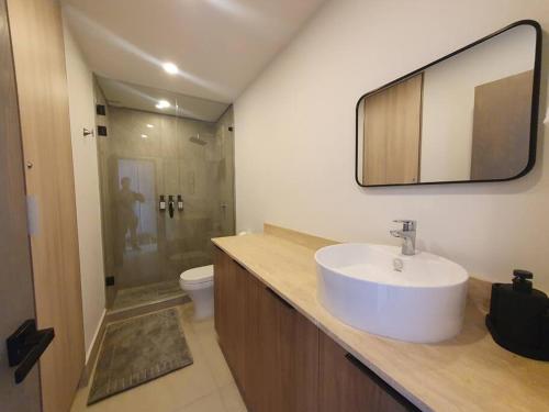 Koupelna v ubytování Hermoso condominio 3 recámaras