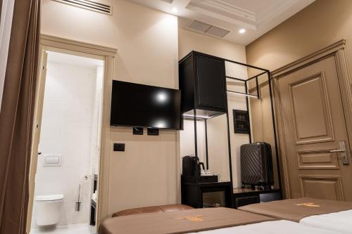 Letto o letti in una camera di Art Gallery Boutique Hotel