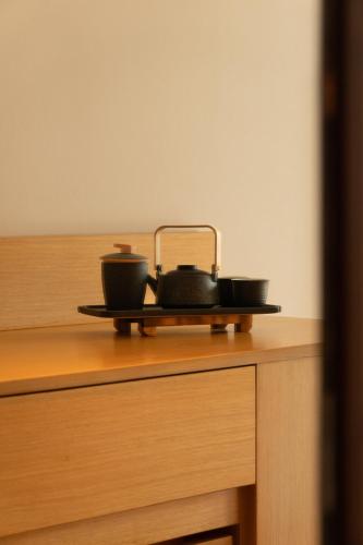 Suzu Saigon - A Boutique Hotelにあるコーヒーまたはお茶